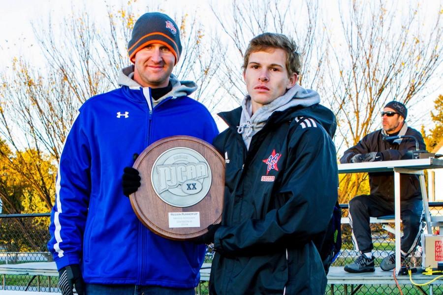 AACC’s Athletics Department Director Duane Herr and student athlete Brent Orbell.