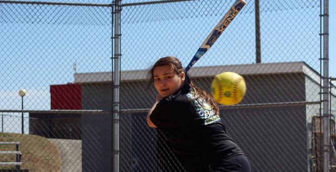 Student Athlete of the Month Nicole Cox has a Sharp Eye for a Good Hit