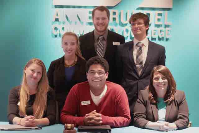 SGA President Nick Nadeau (center, bottom) and his new cabinet gather after Monday’s vote.