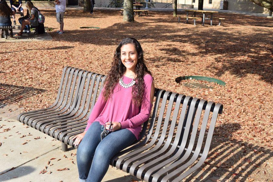 First Time voter Jessica Lease relaxes in the quad.