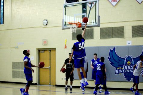 Men’s basketball gets first win of the season