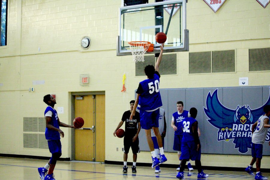 Mens basketball gets first win of the season