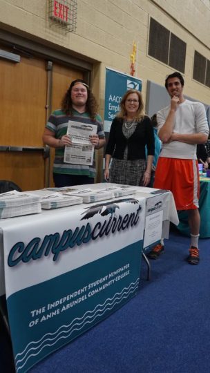 Campus Current staff awaits new recruits at this month's college fair