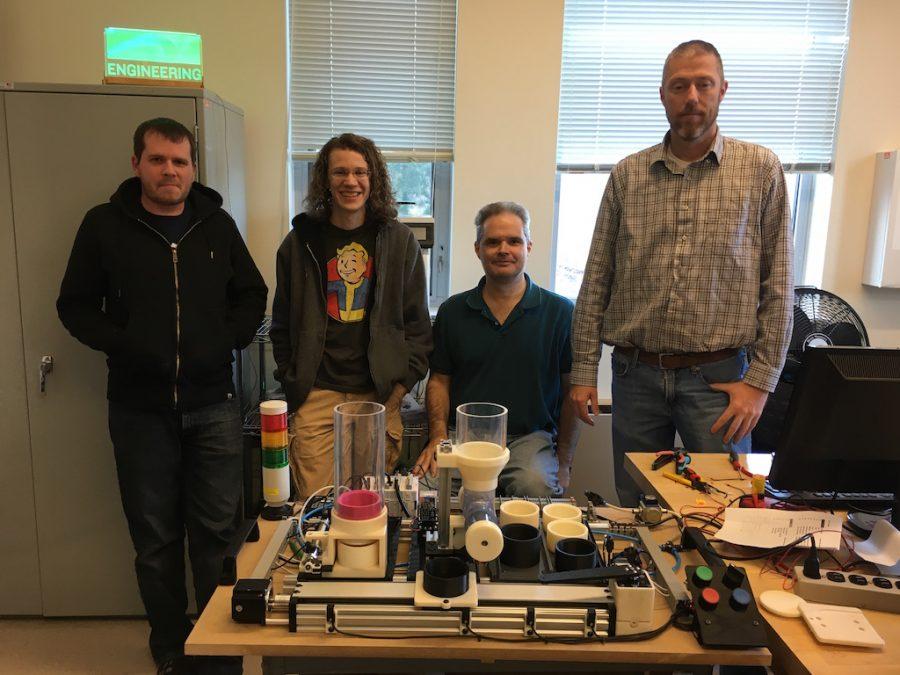 AACC engineering students build a training device to help high school students entering the manufacturing field.