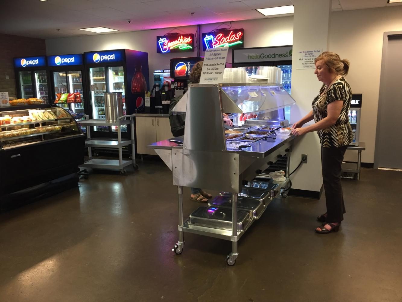 Diners are using the new hot food bar at the Hawk's Nest Grill & Deli.