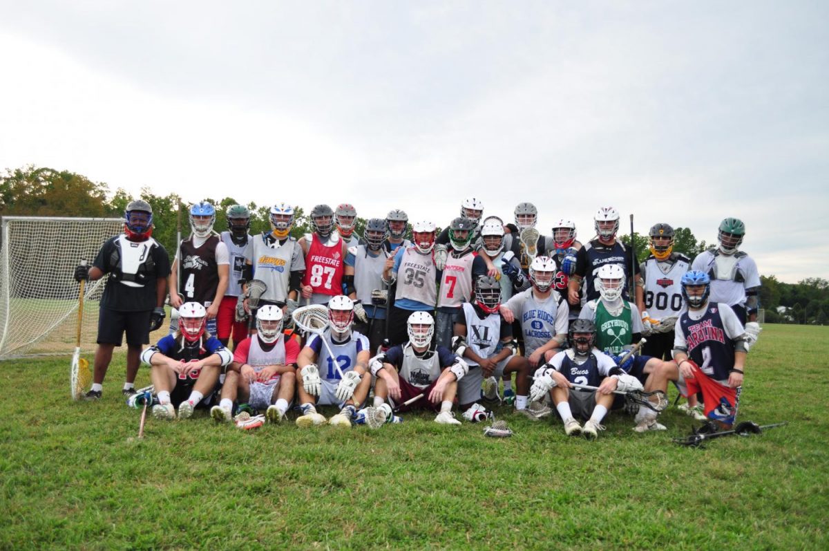 Men’s Lacrosse players pose after a fall ball practice session, months before their regular season.