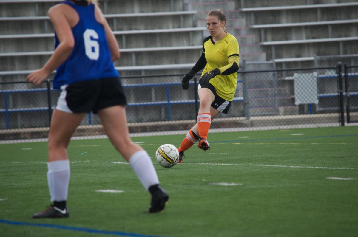 Goalkeeper Deanna Valerien passes to Defender Jaclyn Mullan during a Women’s Soccer practice.