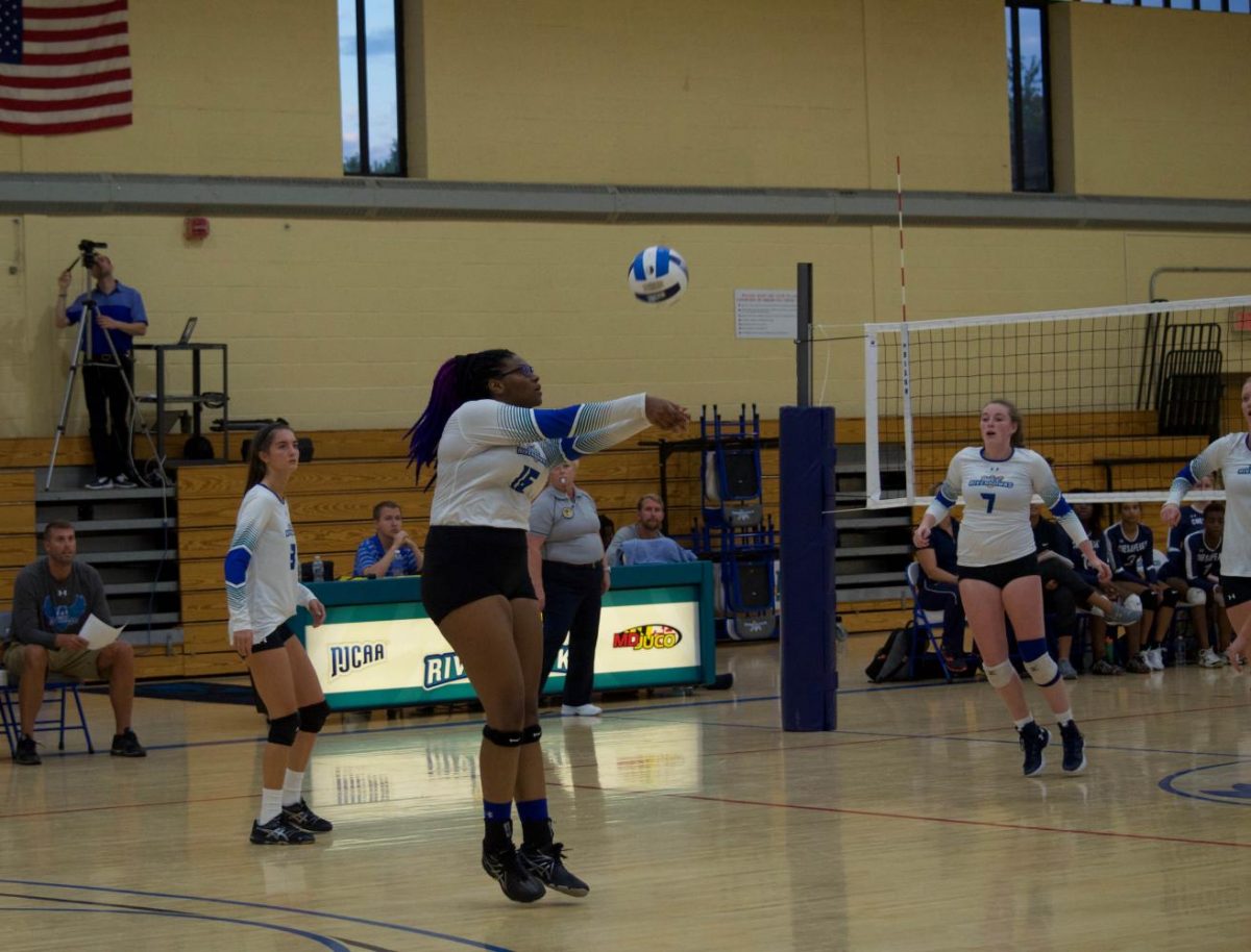 Carly Bohlen (left), Cailin Jones and Brighde Williamson play against the Chesapeake Shipjacks on Sept. 12. 