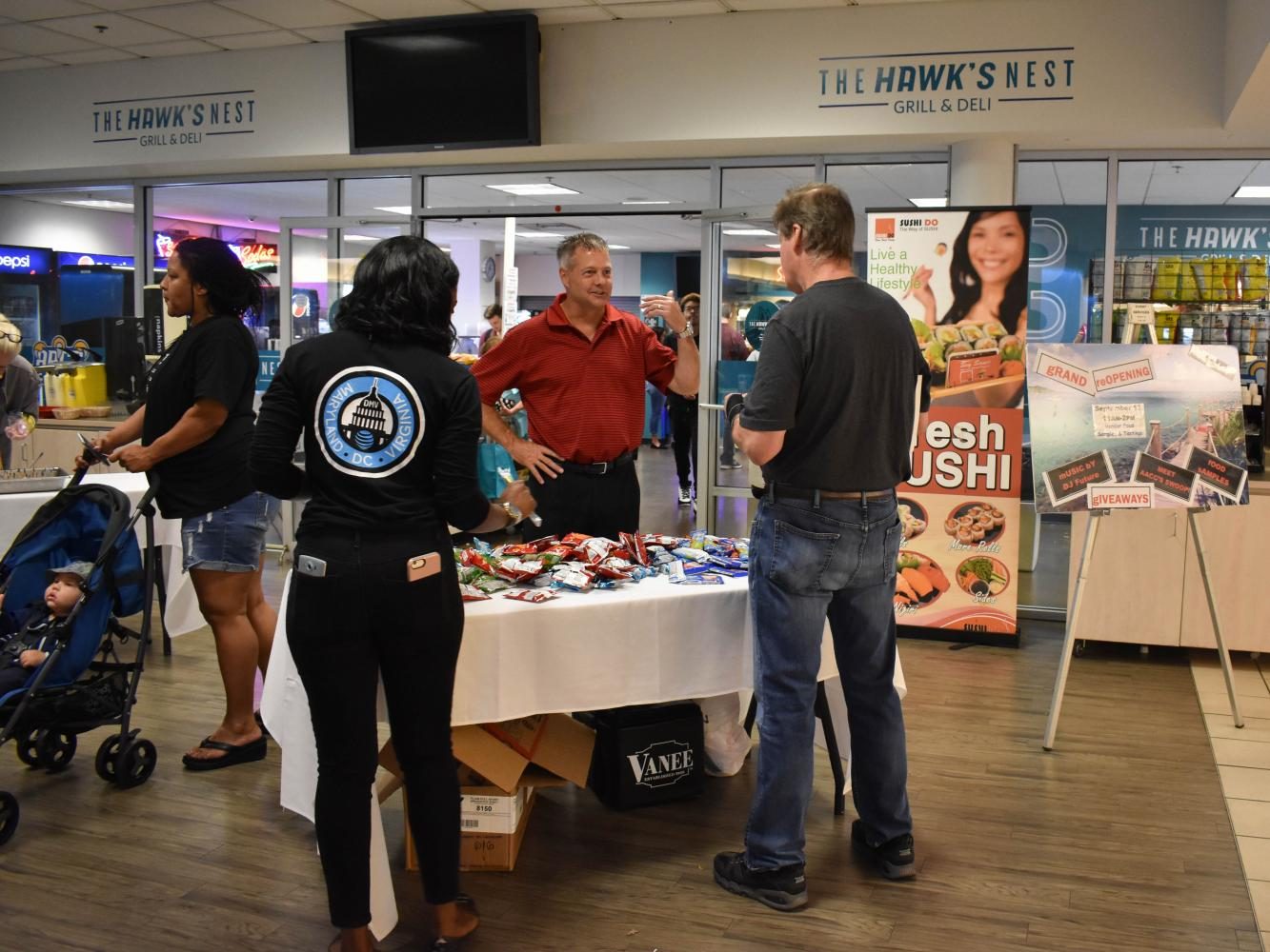 One of the vendors giving out samples of lobster salad. 