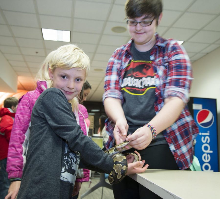 Participants encounter insects and reptiles such as snakes, cockroaches and earthworms up-close and personal during AACC’s annual Science Night.