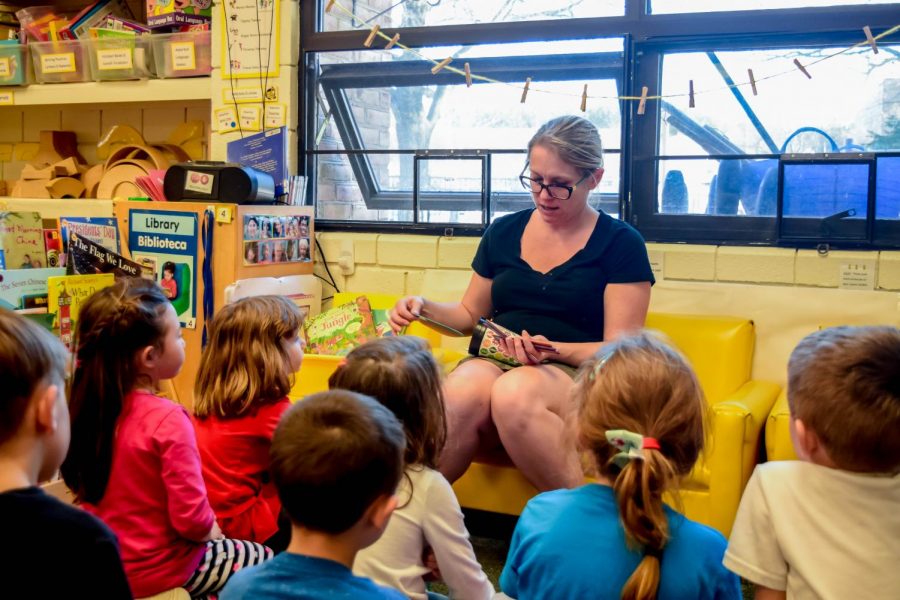 Wendy Milasi, a teacher at AACC’s Child Development Center, works with children. The Student Education Association also works with the CDC children.