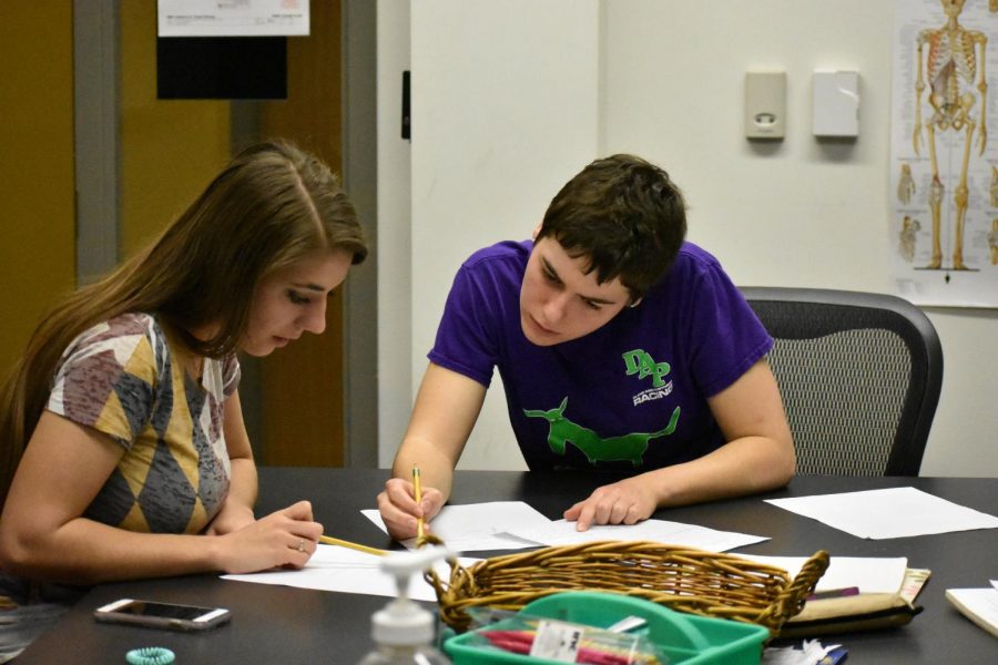 Second-year students Jessica Strauss (left) and Hannah Peterson work on their math homework in a study group.
