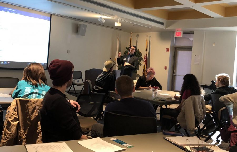 Johnathon ODea accepts student senator nominations at a monthly meeting of student leaders.
Photo by Roxanne Ready