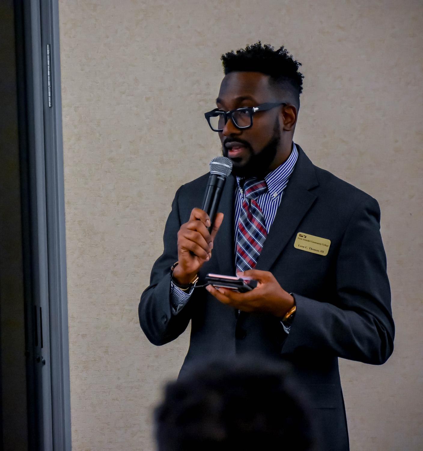 Program Manager Leon Thomas talks with minority students and community members during the Black Male Initiative Summit on campus in February.