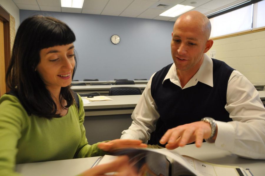 Professor Robert Beatty helps AACC students and community members like Suanne Roueche file their taxes for free. 