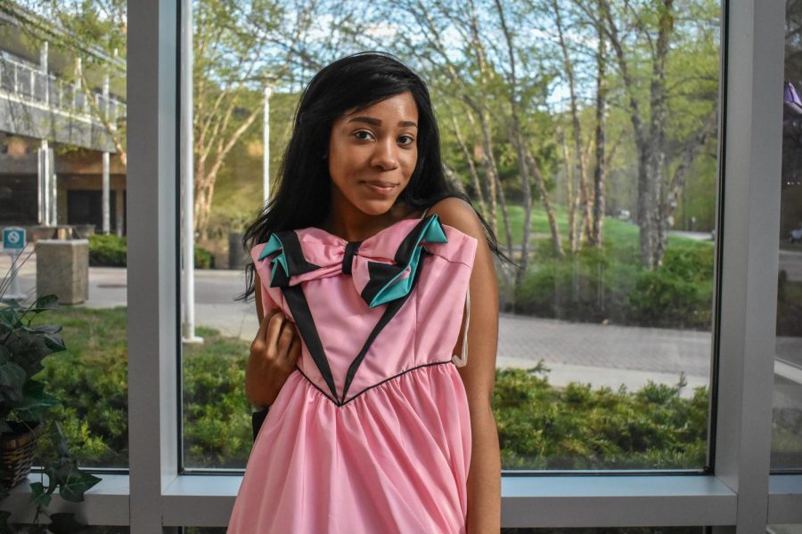 Second-year+secondary+English+education+student+Lakeesha+Kenney%2C+like+other+AACC+students%2C+is+eligible+to+donate+her+used+prom+dress+to+a+high+schooler.++