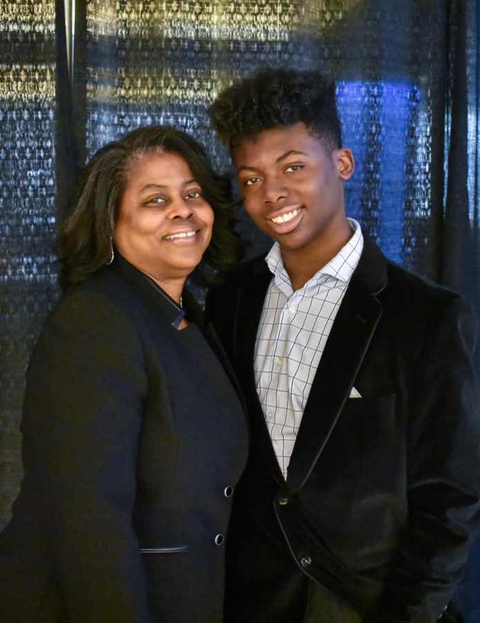 Third-year transfer studies student Torrington Davis Ford—shown here with his mother, Tarita Ford—is graduating from AACC at 15 years old, the day before he graduates from high school.