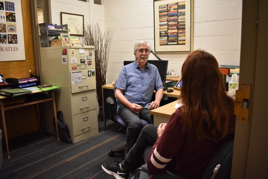 English professor Dave Meng says his policy is to keep his door open during student conferences. 