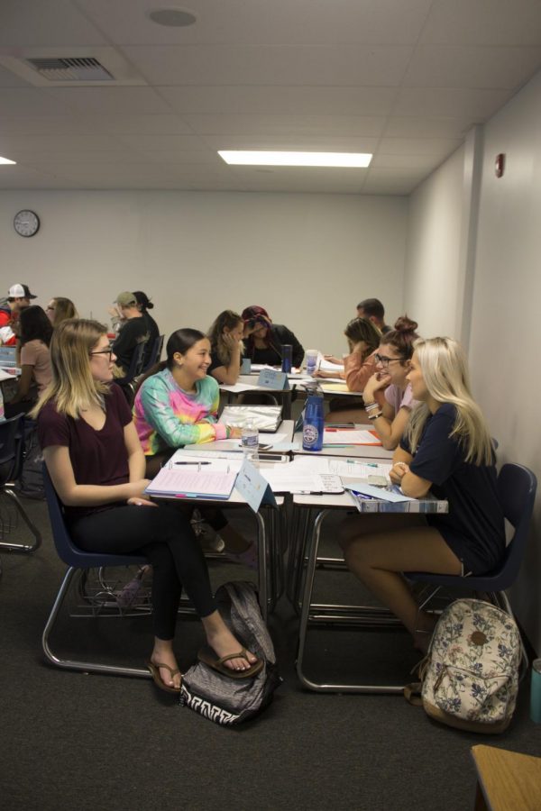 Psychology professor Julie Grignon has rearranged her class into groups to help engage students.