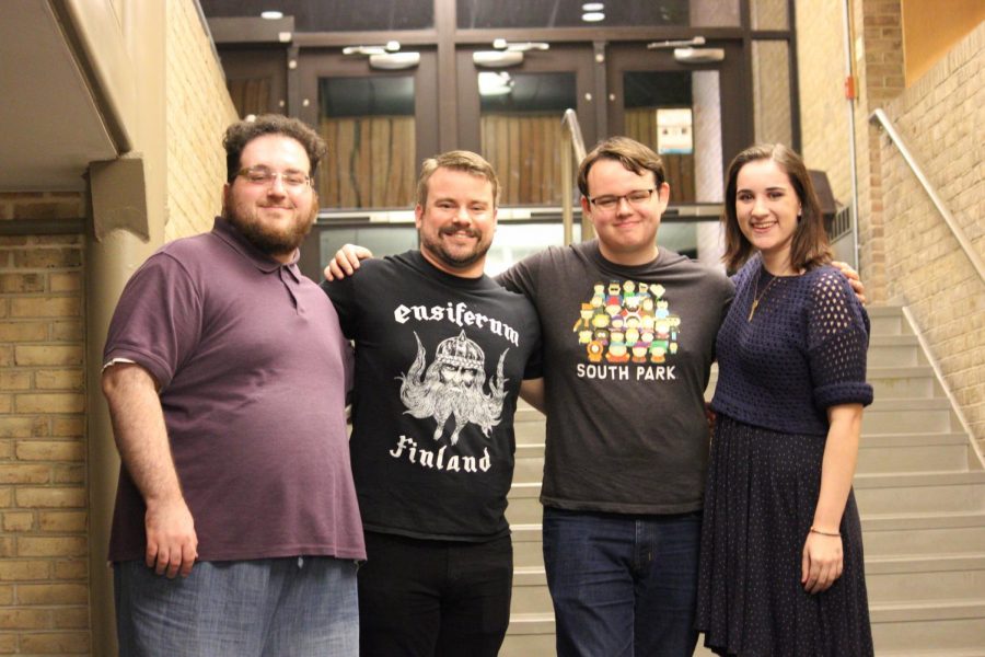 Amaranth members pose after their monthly open mic night event, called Coffee House.
