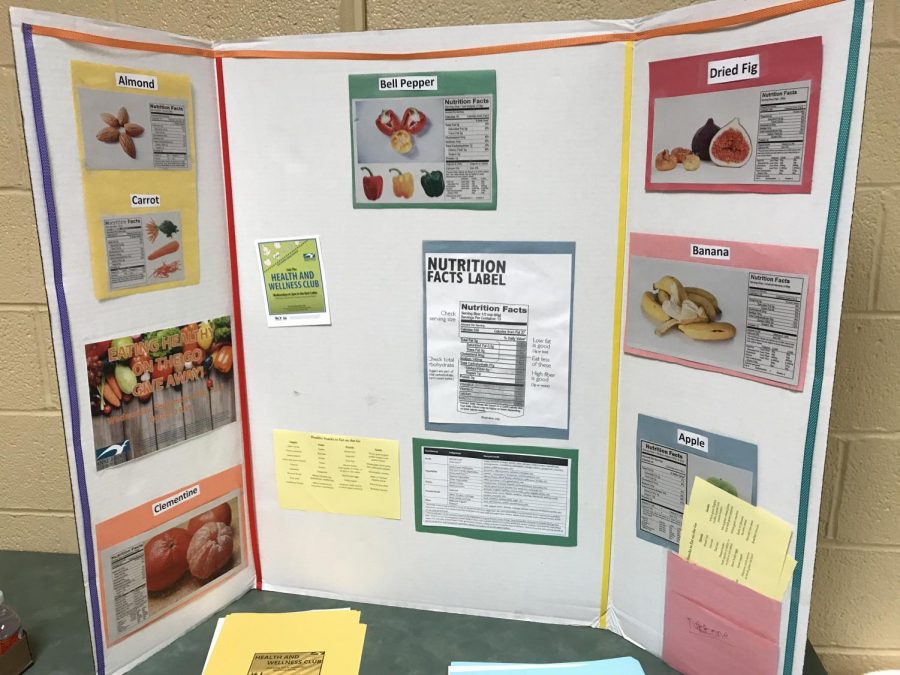 The Health and Wellness club offered free fruit and informational charts in the back of the room. 