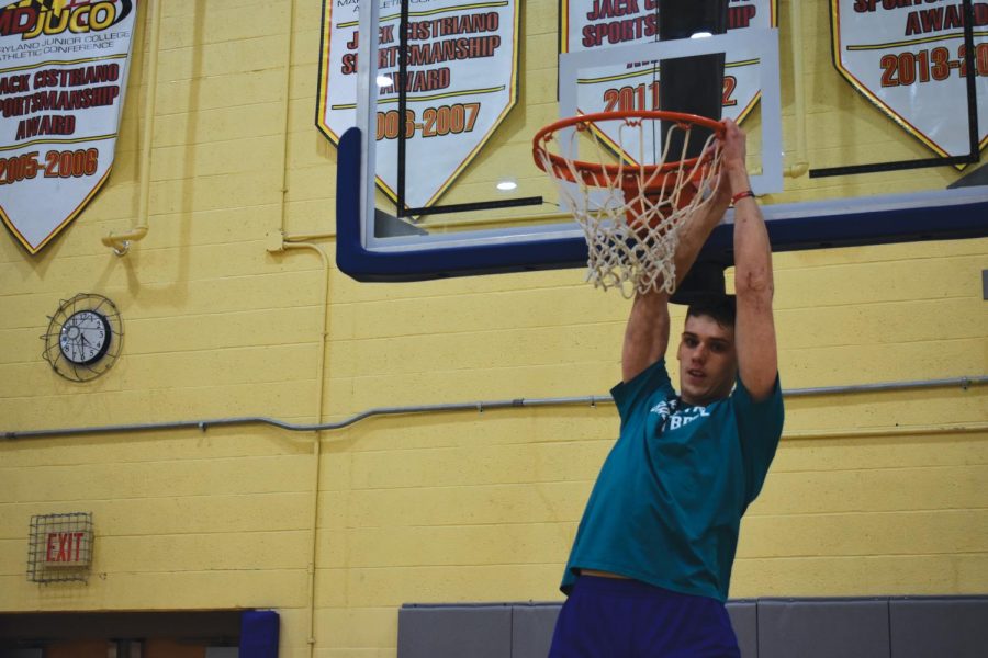 Jacoby Rojas, power forward on Men’s Basketball, warms up. AACC is adding a basketball course.