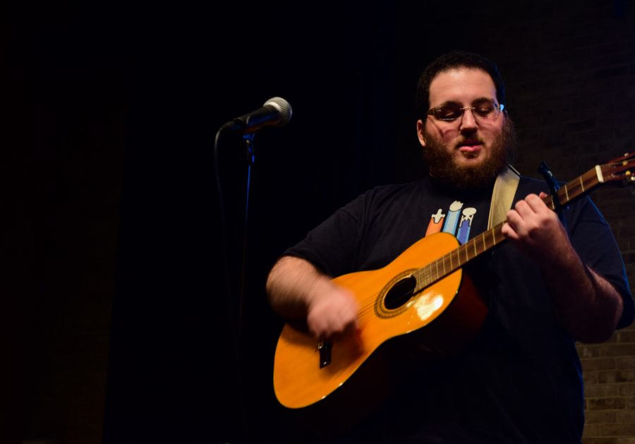 Jonas Pallaro-Sonneborn, a fourth-year creative writing student, performing at a previous coffee house.