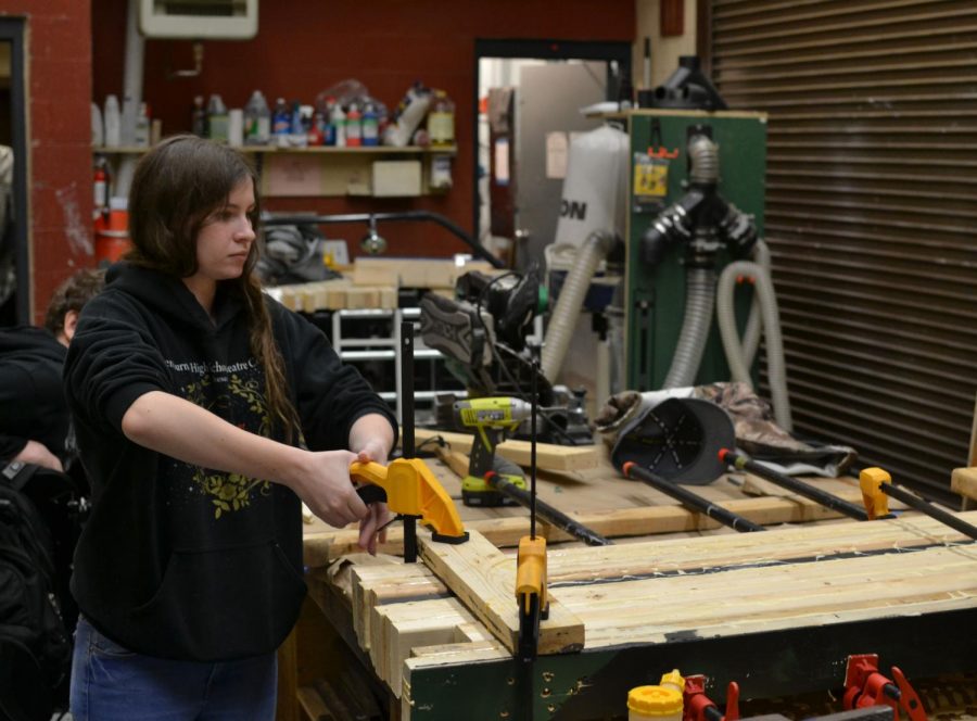 Lauryn Damron, a first-year theater student, makes props for the “Romeo and Juliet” production.