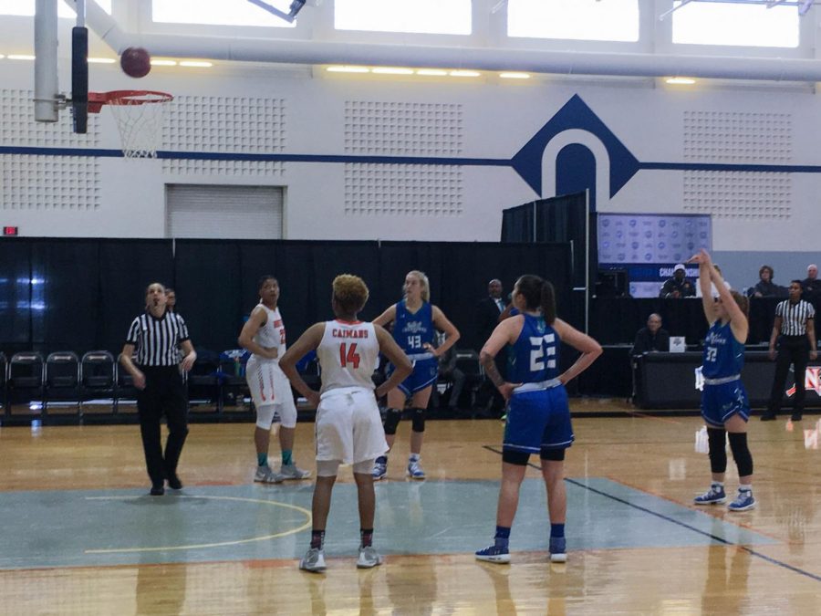 Lacey Hinkle, forward for the Riverhawks, shoots and scores a free throw