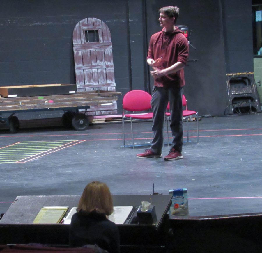 Jack Venton develops his character with direction from Dr. Saunders.