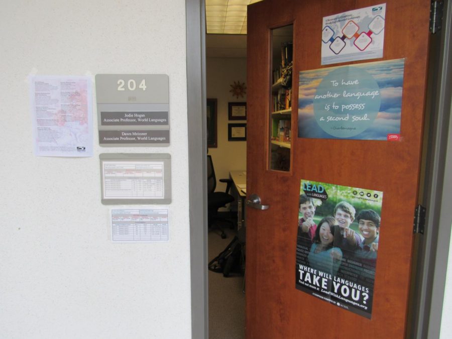 Spanish Professor Jodie Hogan’s door displays one of her favorite quotes: “To have another language is to possess a second soul.”