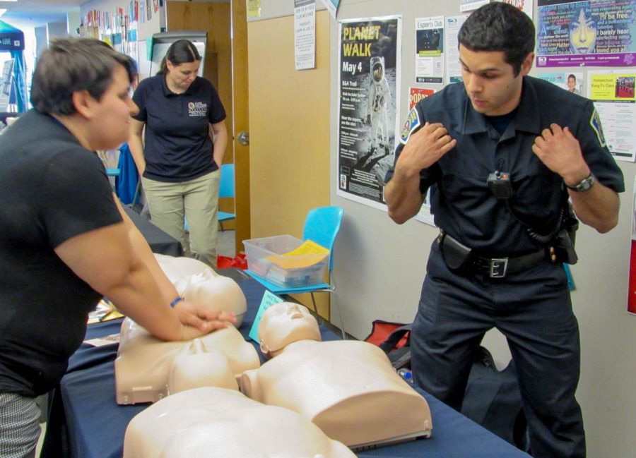 AACC Public Safety Officer Nathan Bruno taught people a crash course on CPR using the song Staying Alive.