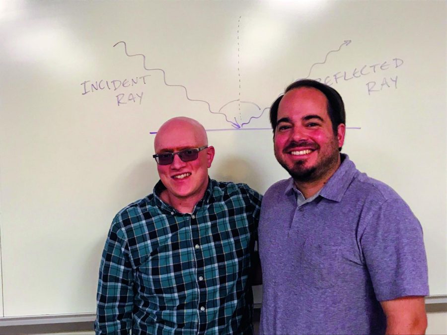 Dr. Seth Miller (right) and Dr. Anthony Santorelli, both science professors, are creating a special topics class about climate change next fall. 