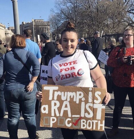 First-year transfer studies student Ruth Stimely says she considers herself an activist. Above, she attends a rally protesting President Donald Trump.