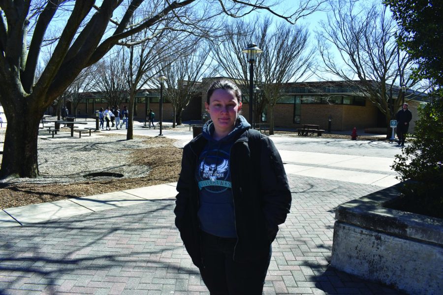 AACC Riverhawks like second-year creative writing student Rani Jenkins show their school spirit by wearing the Riverhawks logo on their clothing.