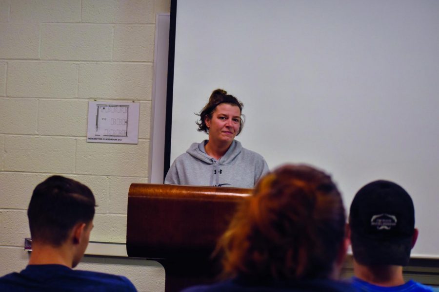 Michelle Rasmussen, a third-year health, fitness and exercise student, gives a speech to her class.