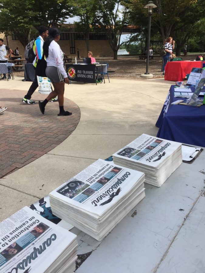 Students promoted their clubs at the community fair, but packed up early after a storm threatened. 