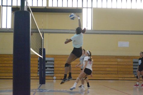 Middle Taliyah Johnson (left), setter Grace Lindemann, outside hitter Sylvia Frye and right side Tori Cain practice for the upcoming Women's Volleyball season.