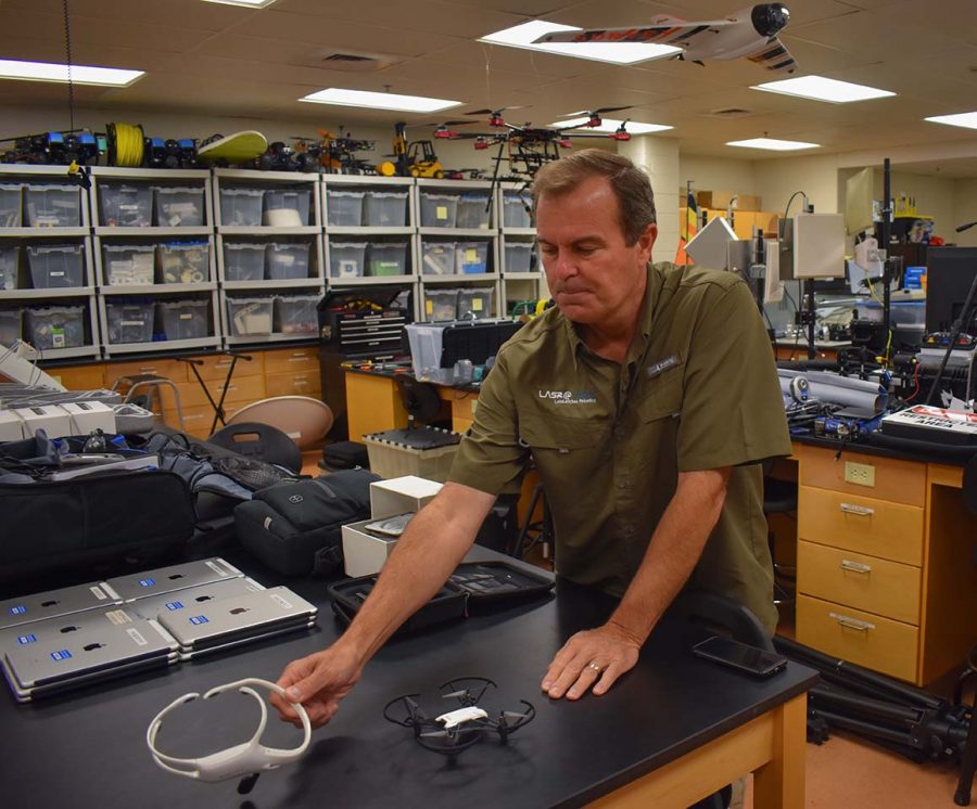 Drone Club members say they believe hands-free drone technology may allow disabled operators to perform more tasks. Pictured: Jim Blanchard, LASR program director.