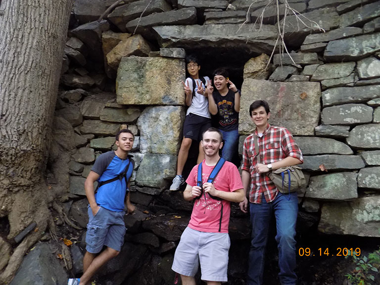 Members of the AACC Adventure Society Club take a break during an outing at Patapsco Valley State Park.