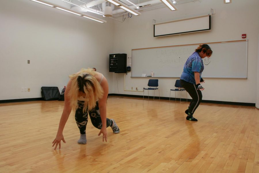 Crystal Jones (left) and Erica Romero (right) practice their routines for the upcoming performance Drag-O-Ween hosted by the Gay-Straight Alliance 