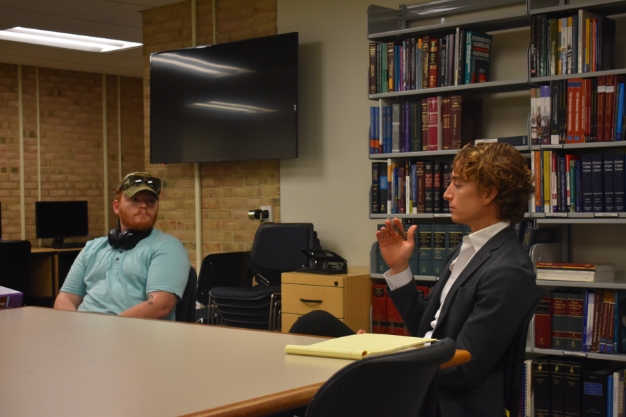 Legal Studies club held their first meeting of the semester Thursday. 
Pictured: Elias Barnard (left) and Professor Luke Fredericks.