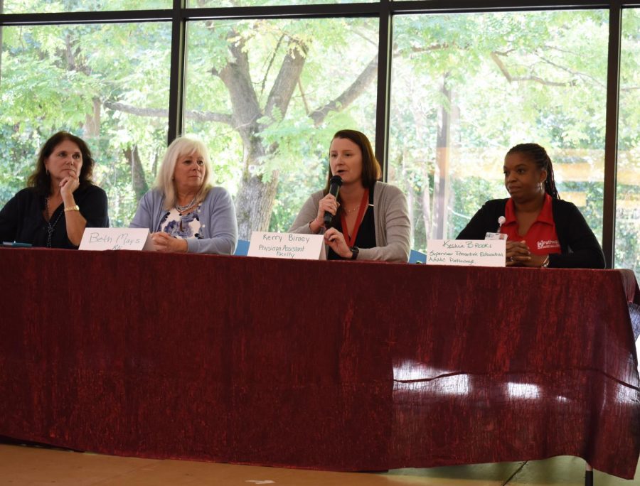 Carol Jacobson, a tobacco treatment specialist, Beth Mays, manager of the Health and Wellness Center, Kerry Birney, a physicians assistant and Keisha Brooks, supervisor prevention education AAMC Pathways talk about the use of vaping among young people at a panel discussion hosted by AACC.