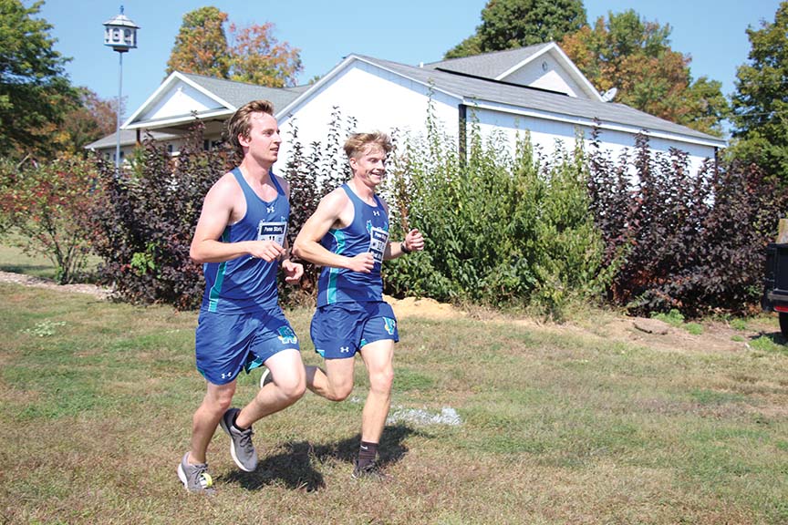Timothy Caldwell, a first-year graphic arts student (left), and Brendan Quinn, a first-year health fitness and exercise science student, are two of three runners to join Men's Cross Country so far. 