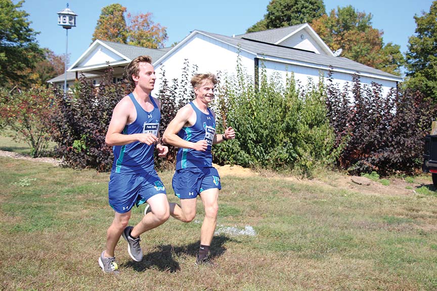 Timothy Caldwell, a first-year graphic arts student (left), and Brendan Quinn, a first-year health fitness and exercise science student, are two of three runners to join Men's Cross Country so far.