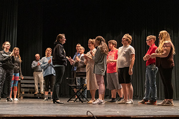 Student actors and performers from the community rehearse for the upcoming “Sunset Boulevard.”
