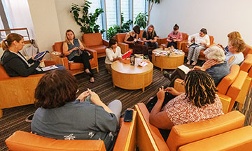 Members of a new knitting club discuss social justice issues while they craft.