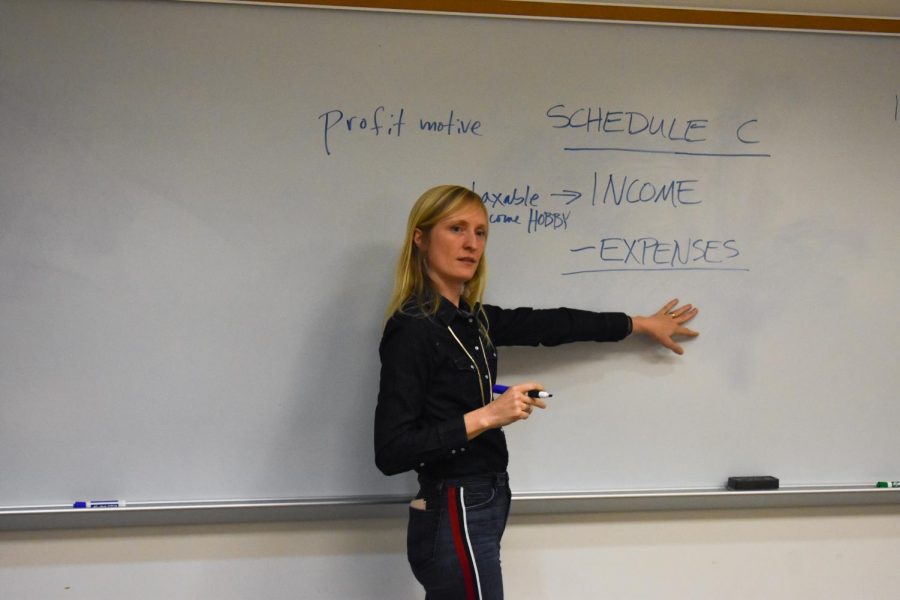 Speaker Hannah Cole explains filing taxes to creative entrepreneurs and artists.