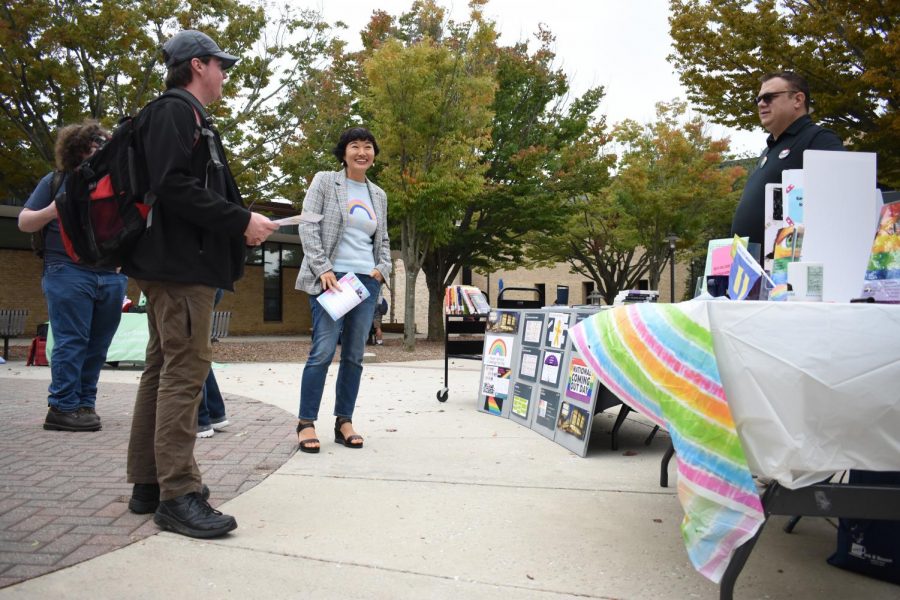 Professor Mea Lee and Dr. Richard Otten at the coming out fair.