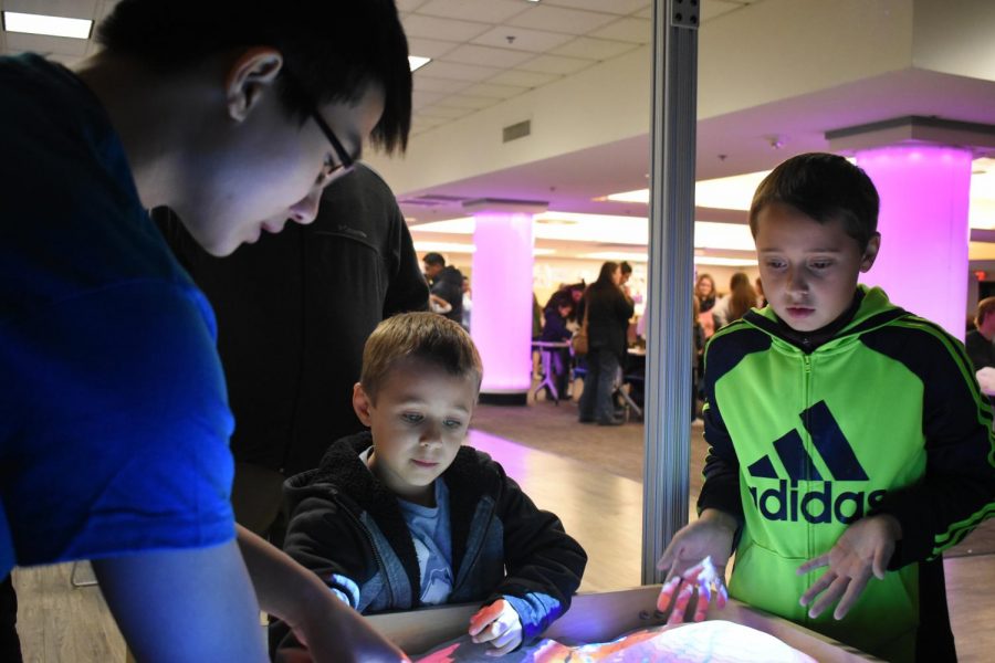 AACC students teach visiting children on Science Night